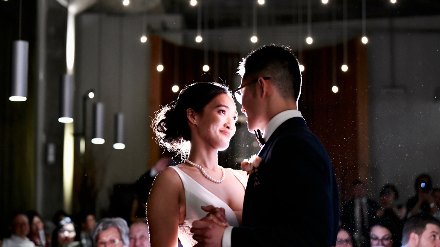 Don Chen and his wife sharing a dance at their wedding